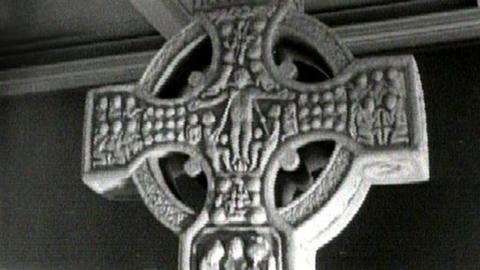 A black and white image of a Celtic Cross.