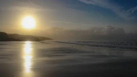 Mark Tugwell This sunrise over Amroth beach in Pembrokeshire was captured by Mark Tugwell