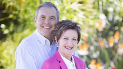 PA Alan Fletcher and Jackie Woodburne as Carl and Susan Kennedy in Neighbours