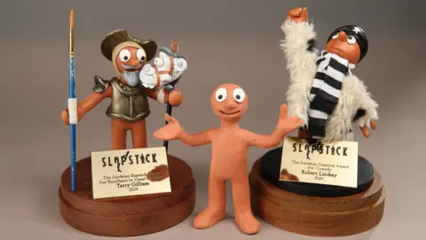 Aardman Animation/Slapstick Festival Two personalised Morph plasticine characters standing either side of the original Morph character
