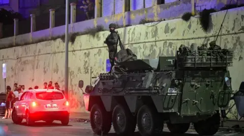 Reuters panish military stands guard at the border between the Spanish enclave of Ceuta and Morocco