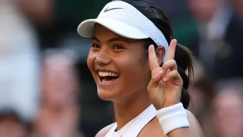 Emma Raducanu celebrates beating Marketa Vondrousova at Wimbledon