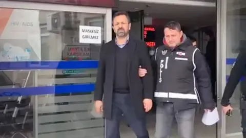 Istanbul Police Mehmet Akay (pictured on the left)