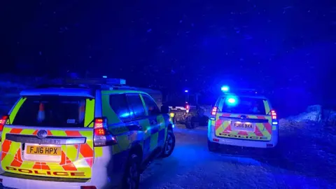 Derbyshire Police Motorists being rescued in the snow