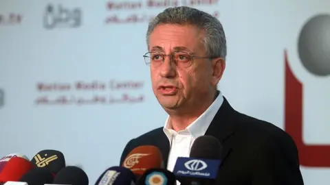 Getty Images Mustafa Barghouti speaks at a news conference in 2014