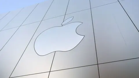 Getty Images Apple logo is seen on the outside of an Apple store in San Francisco, California.