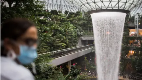 Getty Images Jewel has the world's highest indoor waterfall.