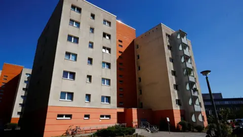 Reuters The apartment building where the Russian national was arrested