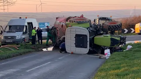 Atlantic Motor Services Tractor on its side