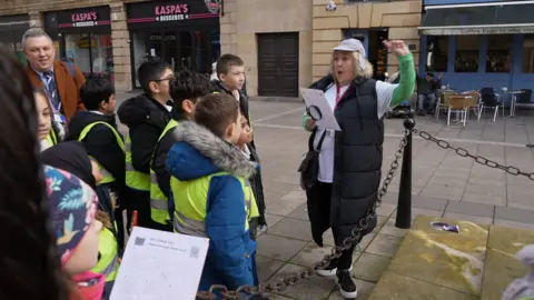 Shaun Whitmore/BBC Children on a treasure hunt in Peterborough