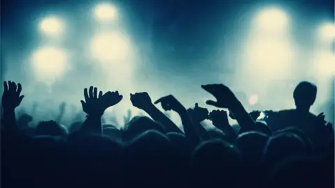 Getty Images People dancing at a rave