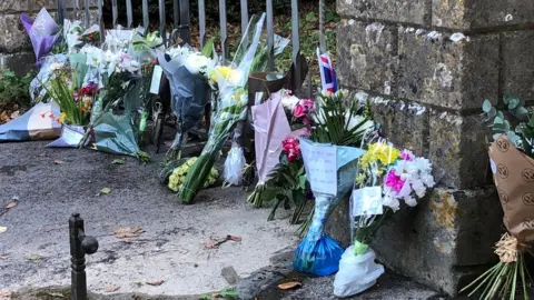 BBC Floral tributes have been left outside Highgrove House.
