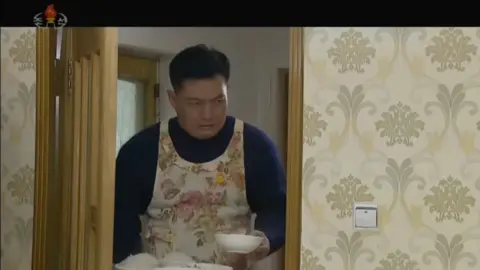 KCTV A man in an apron in a show on KCTV.