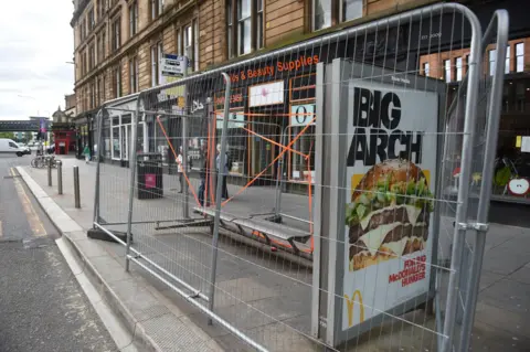 James Chapelard Several bus stops have been boarded up in the Merchant City and Trongate areas ahead of the match, which kicks off at 12:30 on Saturday.
