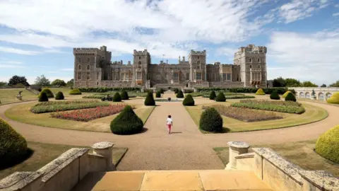 Getty Images Visitors look around Windsor Castle's East Terrace Garden as it prepares to open to the public at Windsor Castle on 5 August, 2020 in Windsor, England. 