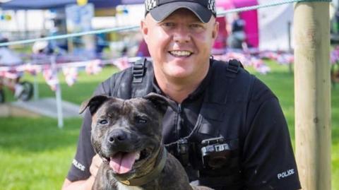 Police dog Cooper and handler PC Tim Moss