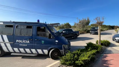 Investigators arriving at the police checkpoint in an area between the cities of Lagos and Praia da Luz to begin the third day of their search