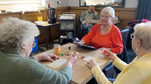 Rose Bannister playing bingo