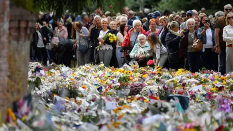 PA Sea of flowers outside Sandringham House in Norfolk for the late Queen Elizabeth 