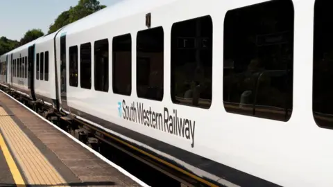 Getty Images A new white South Western Railway passenger train at Micheldever Station in Hampshire.