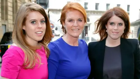 Getty Images Princess Beatrice, Sarah Ferguson, and Princess Eugenie pictured on a street