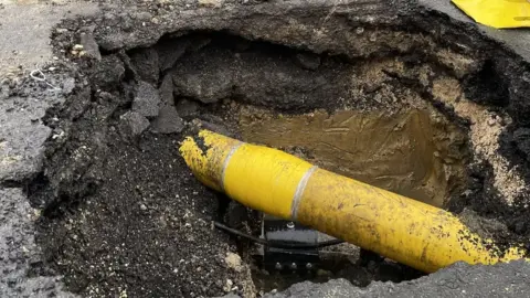 Dave Higgens A gas main - stock photograph