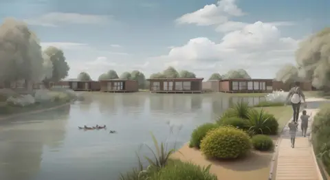 CAD Architects/Kingsley Leisure Developments Limited An artist's impression showing a lake with modern, rectangular houses along the water's edge. The houses have large windows and are surrounded by greenery. In the foreground, there is a wooden path leading towards the houses, with three people walking along it. One person is carrying a backpack. There are also some ducks swimming near the shore.