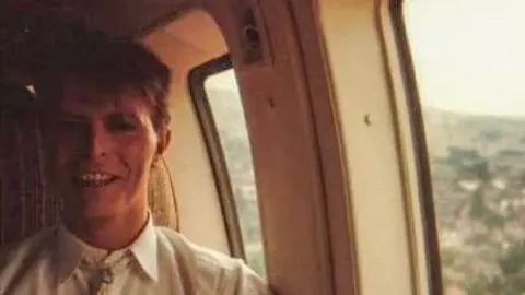 Kevin Armstrong A nervous David Bowie flying in a helicopter to the Live Aid concert in 1985