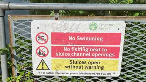 South Beds News Agency A no swimming sign at Cardington Lock, close to Bedford