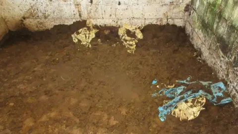 RSPCA handout Stable full of horse faeces and plastic bags