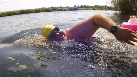 Shaun Whitmore/BBC Sophie Etheridge swimming