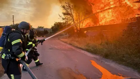 Firefighters put out a fire