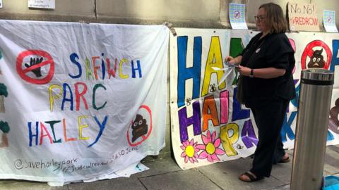 Protesters from The Llandaff North Residents Association with colourful banner