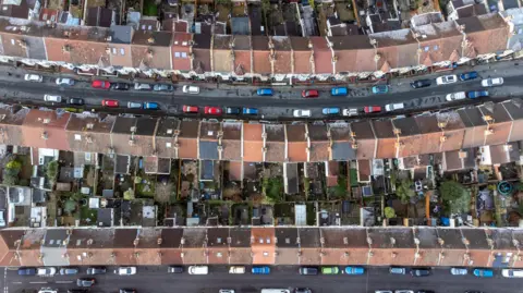 An aerial shot of three rows of terraced houses in Bristol