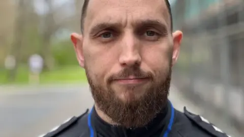 BBC Chief Inspector Mike Vass looking into the camera