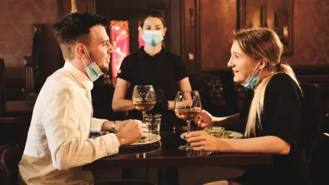 Getty Images Table service in bar