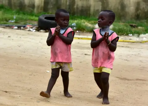 AFP Twins attend the Twins Day celebration on September 8, 2018 in Abobo, suburb of Abidjan.