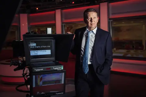 Helen Roscoe-Rutter Bill Turnbull standing next to an autocue