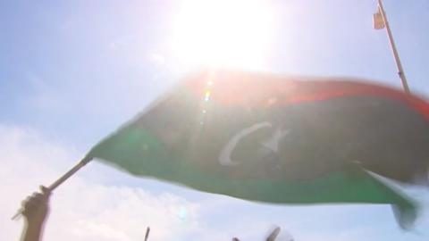 Libya flag waved by rebel fighters