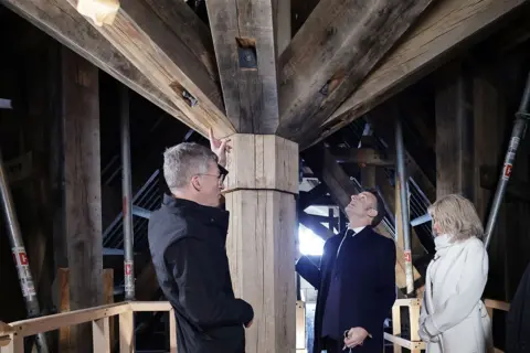 EPA President Emmanuel Macron and Brigitte Macron visit the cathedral