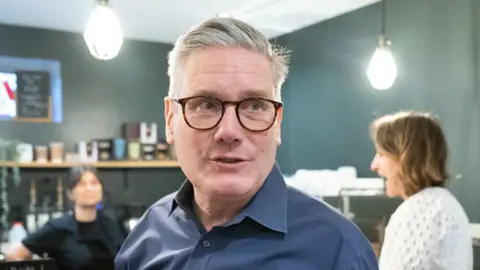 Sir Keir Starmer in a cafe during the general election campaign