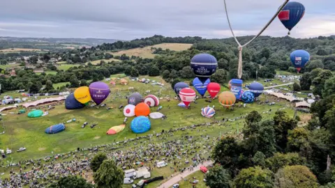 Bristol Balloon Fiesta Hot air balloons on the ground at the Bristol Balloon Fiesta, seen from the air