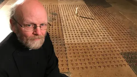 BBC Memorial of crosses at Norwich Cathedral