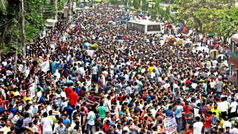 Getty Images Thousands of Bangladesh Nationalist Party (BNP) supporters protest in Dhaka on 10 September 2018