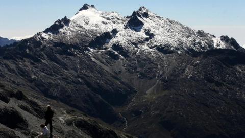 Tourists view Peak Humboldt in the Venezuelan Andes.