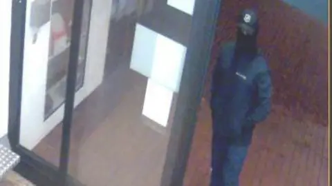 Gelsenkirchen police A man with his hands in his pockets in a mask