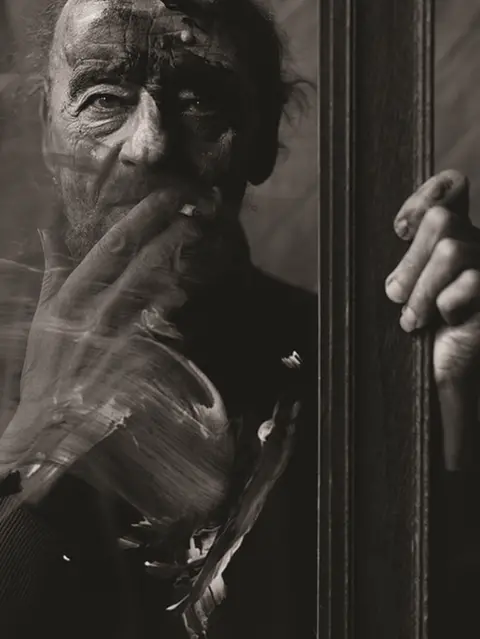 Simon Murphy A photograph of Alan Tanner smoking