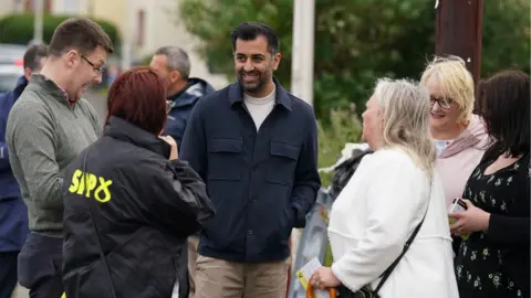 PA Media Humza Yousaf campaigning