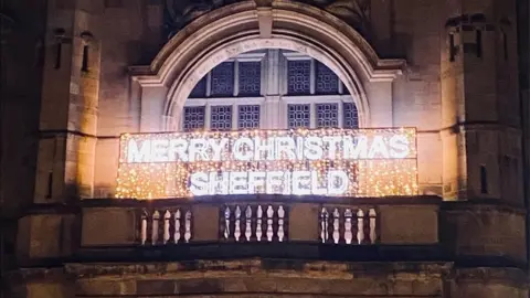 Sheffield City Council Sheffield Christmas lights reading 'Merry Christmas Sheffield'