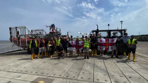 Robin Sherlock Bob Crane with RNLI Portishead team and his family